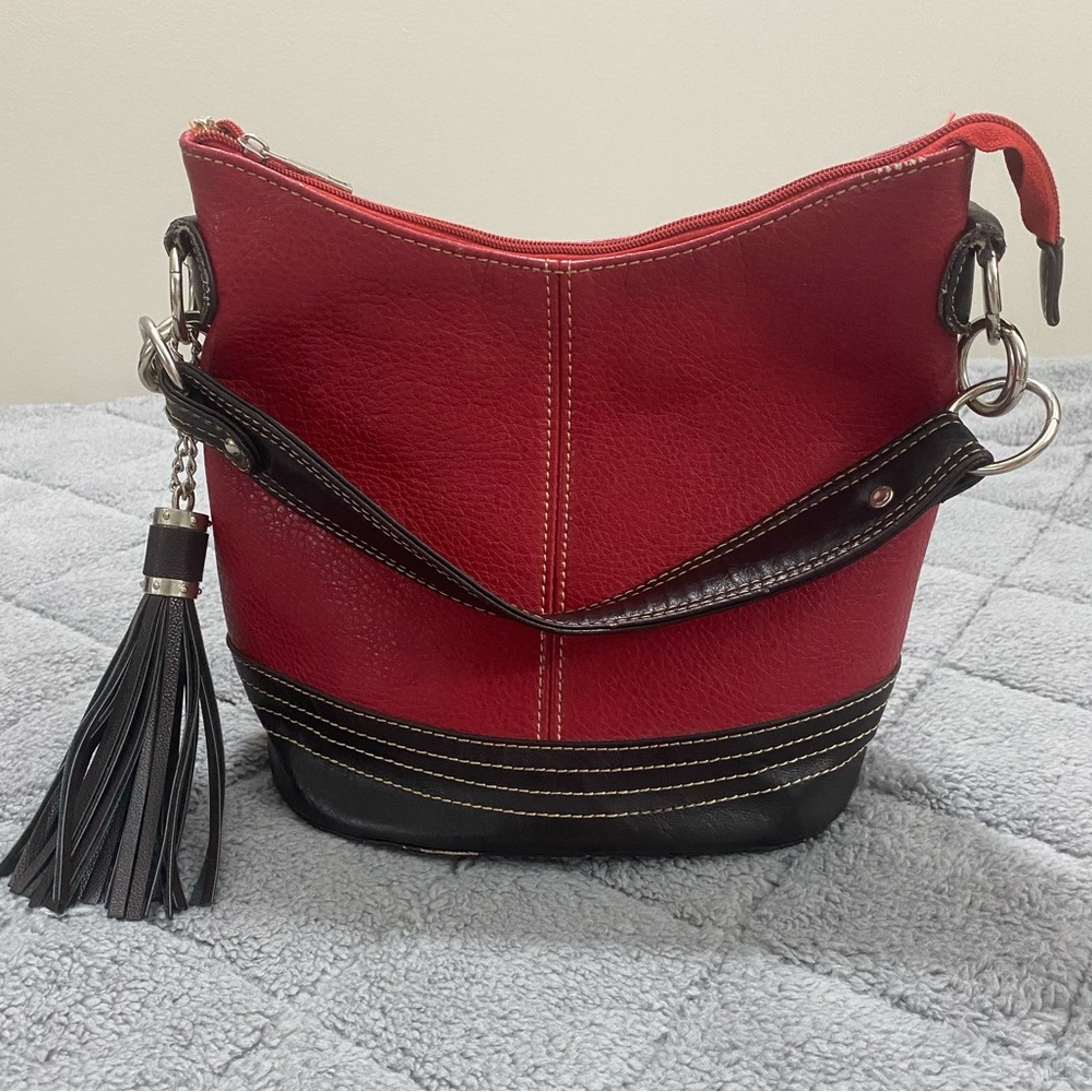 Red and black man made bag